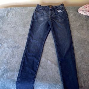 Have been worn multiple times. Dark blue.